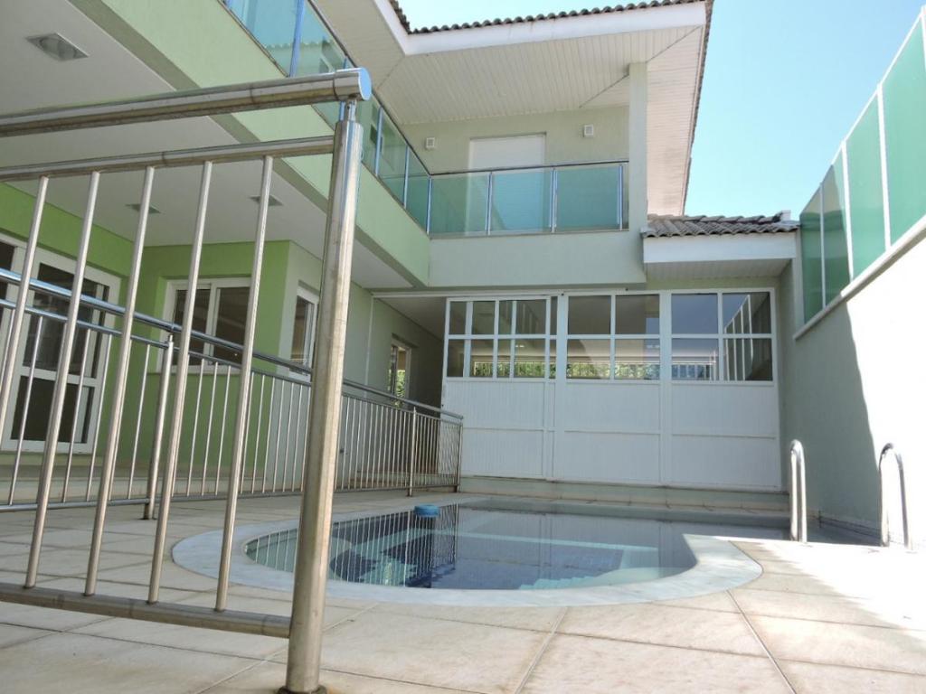 Casa de Condomínio à venda com 4 quartos, 400m² - Foto 18