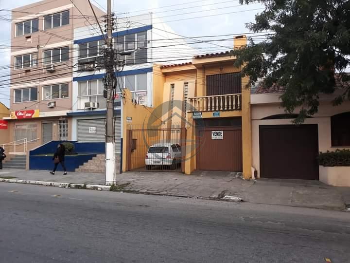 Casa à venda com 4 quartos, 284m² - Foto 1