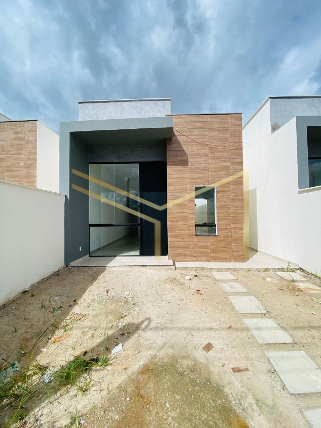 Casa à venda com 3 quartos, 70m² - Foto 1