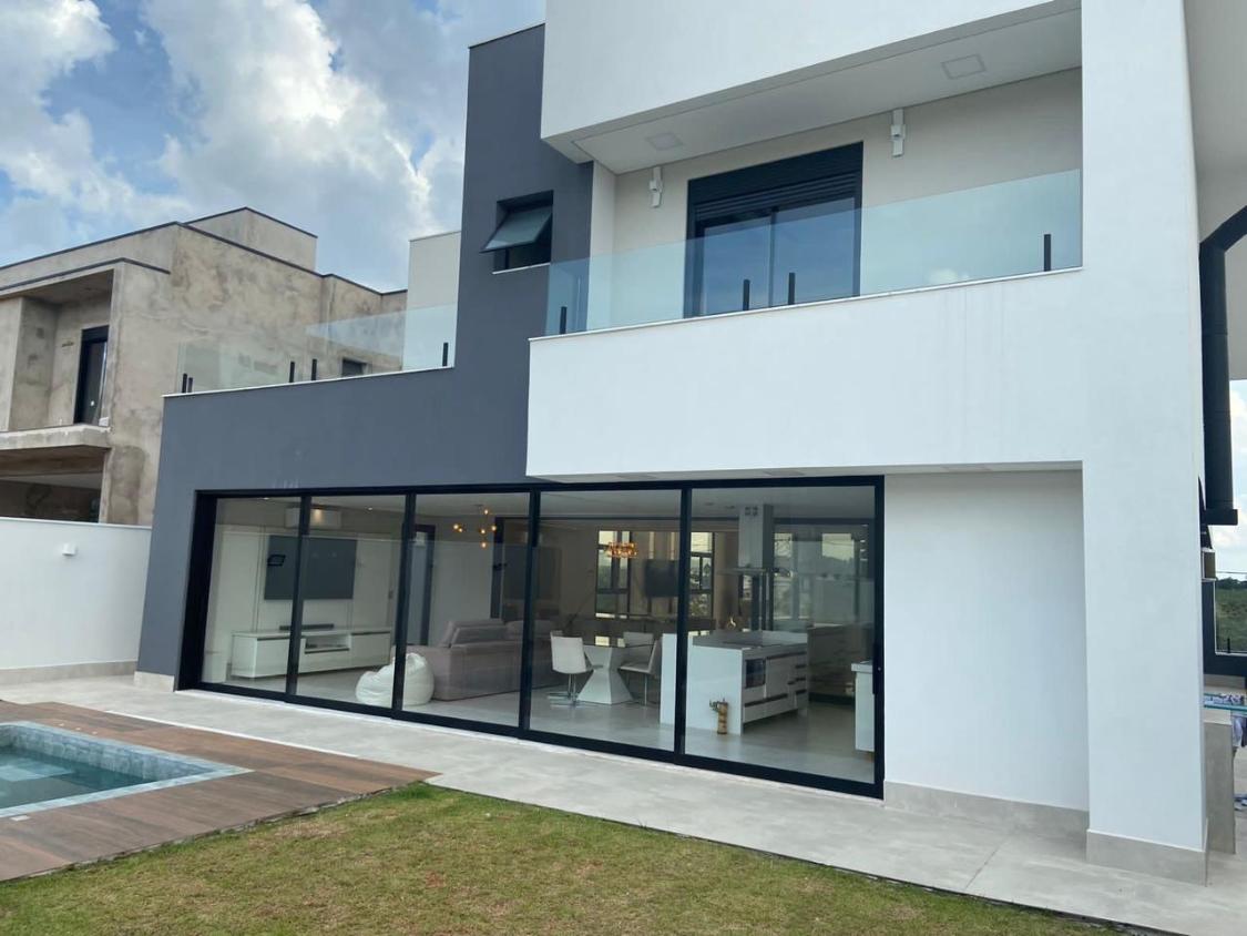 Casa de Condomínio à venda com 4 quartos, 414m² - Foto 2