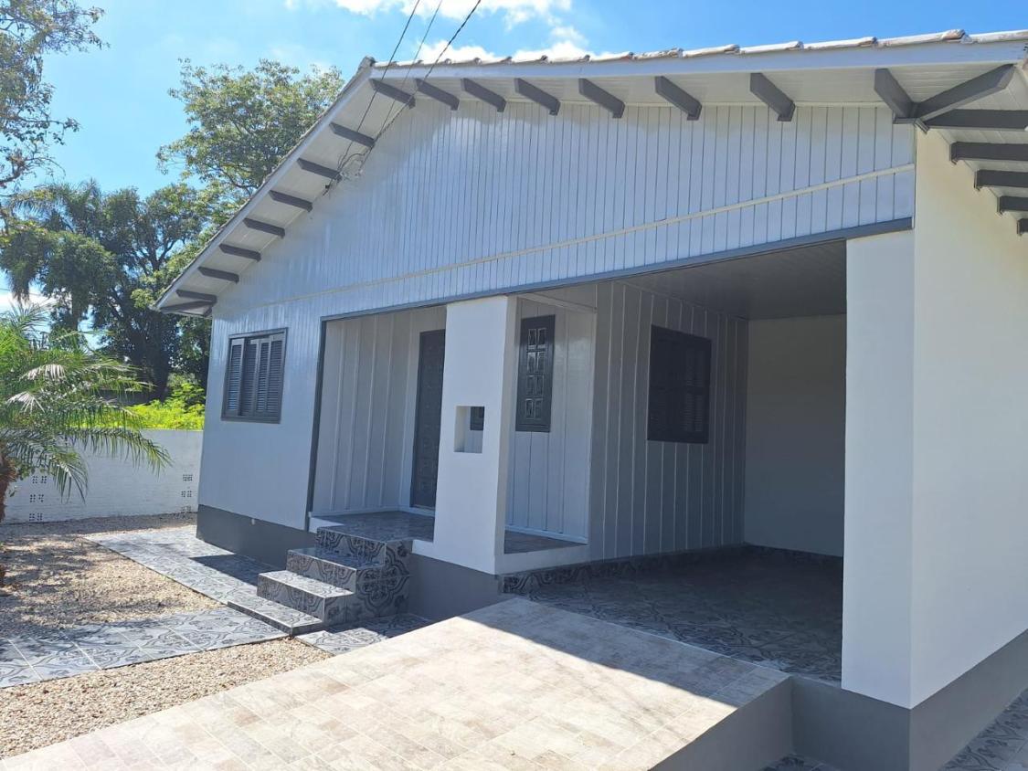 Casa à venda com 4 quartos, 100m² - Foto 4