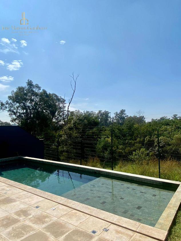 Casa de Condomínio à venda com 4 quartos, 355m² - Foto 1