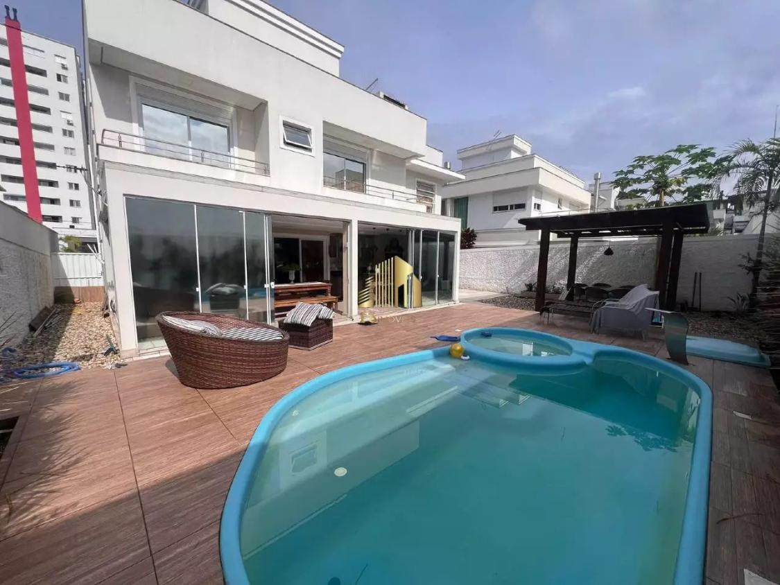Casa de Condomínio à venda e aluguel com 3 quartos, 348m² - Foto 1